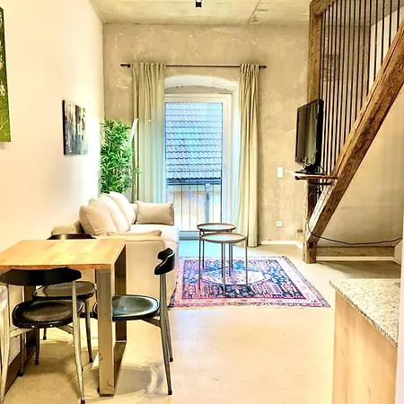 Ferienwohnung Waterfront - Urbane Eleganz Am Bachufer Villach Exterior foto